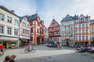 historic market square of Bernkastel-Kues, Middle Mosel, centuries-old half-timbered houses, the Renaissance town hall (1608), the St. Michaels fountain (1606) and the Spitzhäuschen (1416) are a reflection of the Middle Ages historic market square of Bernkastel-Kues, Middle Mosel, centuries-old half-timbered houses, the Renaissance town hall (1608), the St. Michaels fountain (1606) and the Spitzhäuschen (1416) are a reflection of the Middle Ages
